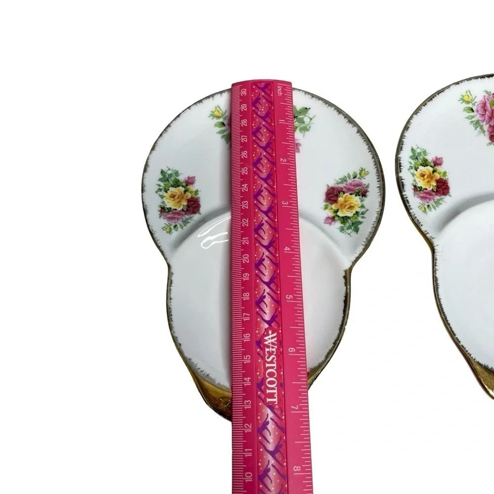 Sitra two (2) Fine ceramic Floral/ gold trim Ceramic Tea saucer/trinket dishes